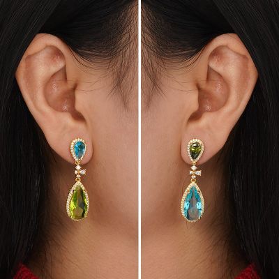 Cuelga Los Pendientes De Piedras Preciosas De Colores